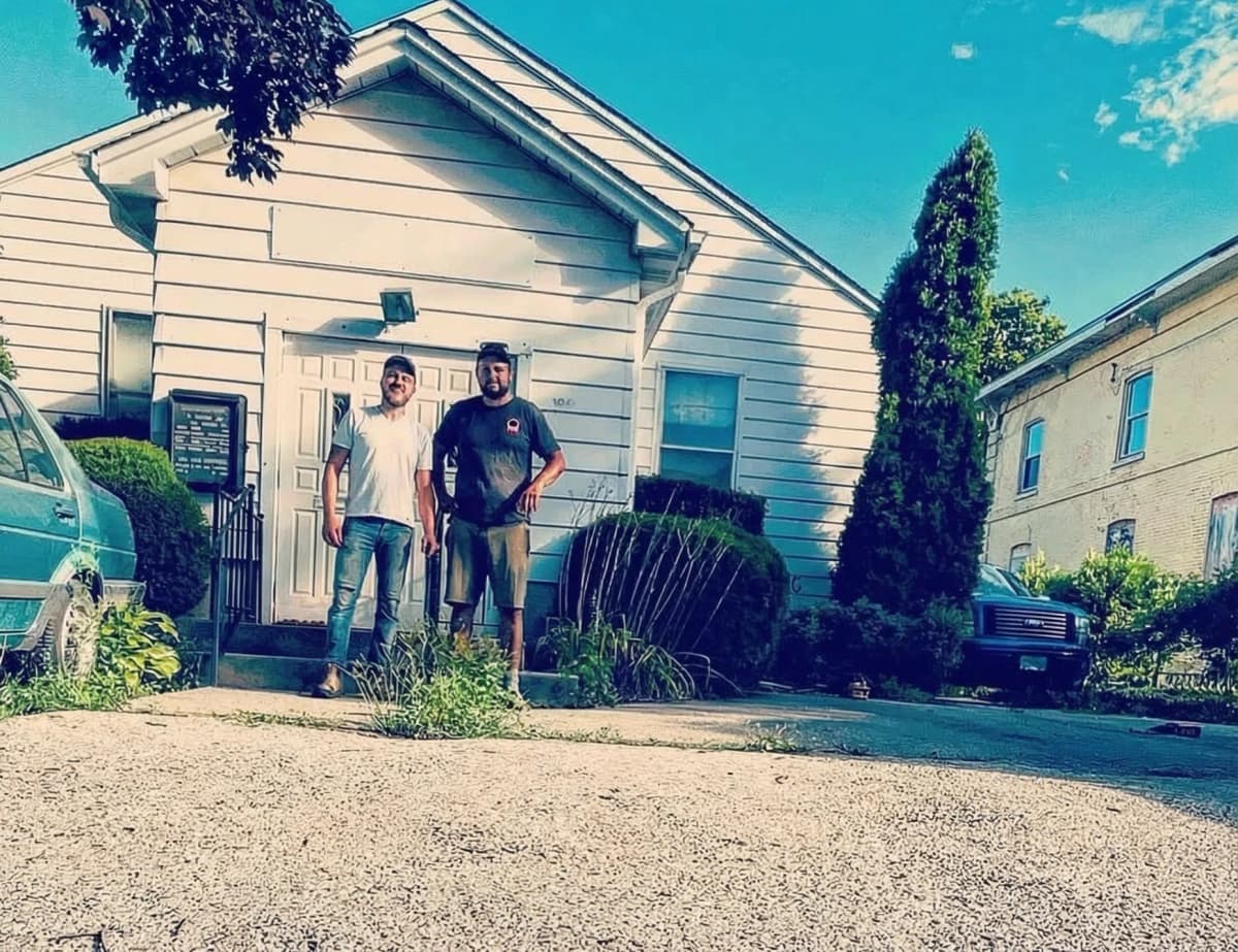 Kuzyn in front of first job